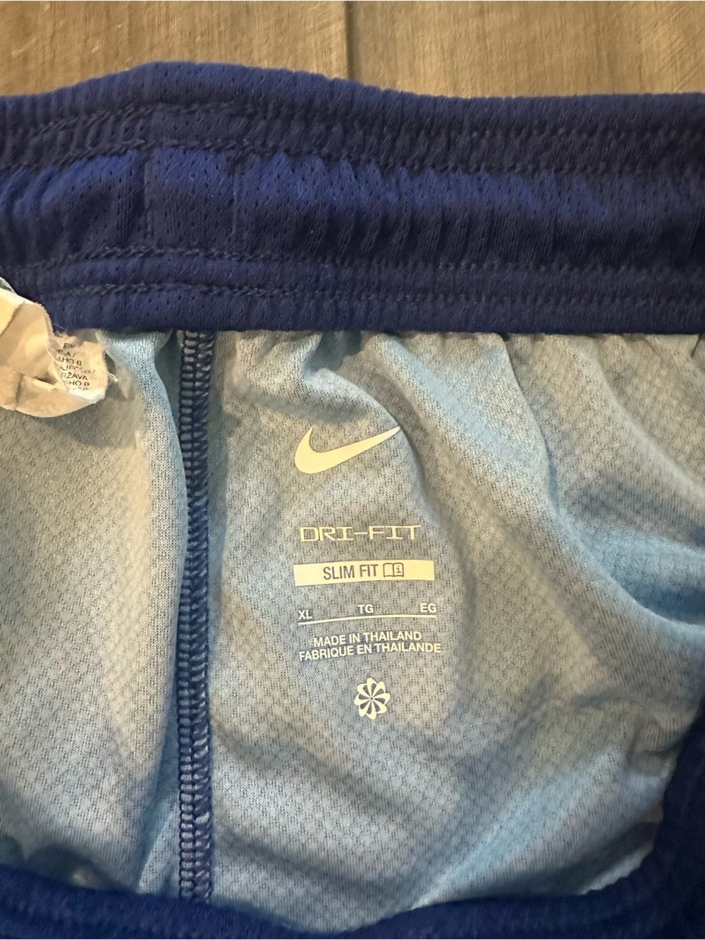 Nike Blue FC Barcelona Shorts with Red Trim and Yellow Swoosh